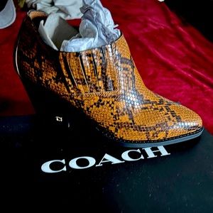 I am selling these Coach ankle boots